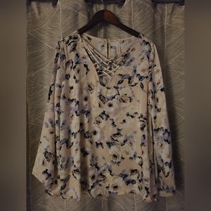 Boutique blouse. Never worn. Cream color with pink and blue tones. Size Large.